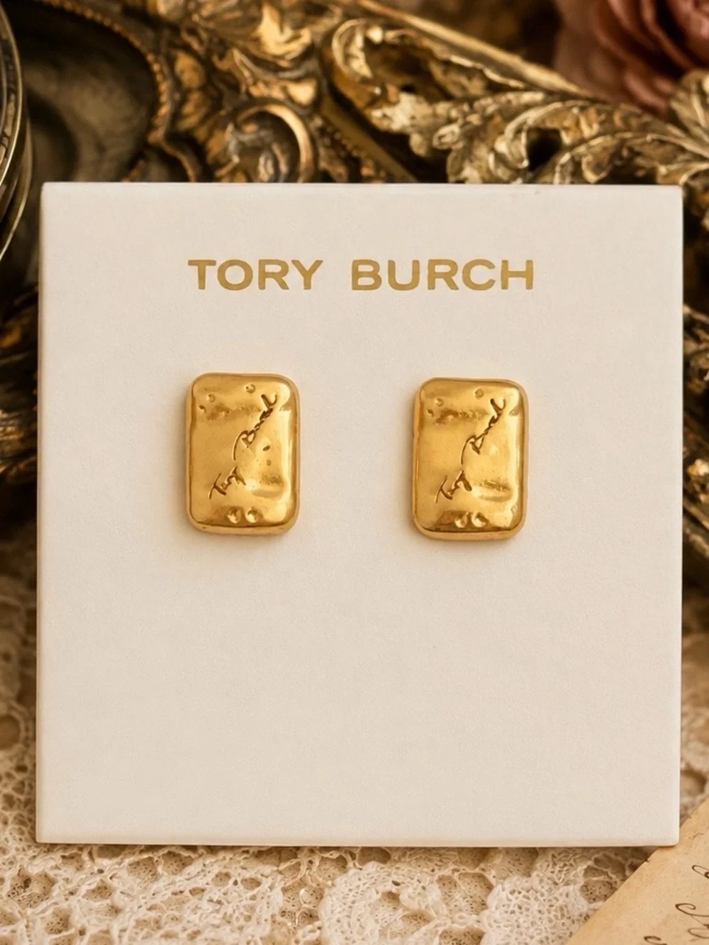 TORY BURCH • Gold Torsade Signature Luggage Tag Nugget Logo Plaque Earrings